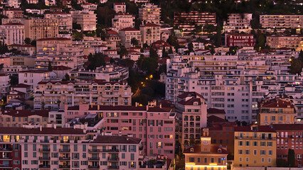 Obraz premium Beautiful aerial view over district Quartier du Port in the downtown of Nice, France at the French Riviera in the evening light after sunset.