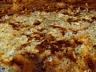 Panorama of surreal colors and Mars like landscape created by Sulphur springs in the hottest place on earth, the Danakil Depression in the Afar Region of Ethiopia.