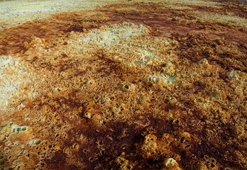 Panorama of surreal colors and Mars like landscape created by Sulphur springs in the hottest place on earth, the Danakil Depression in the Afar Region of Ethiopia.