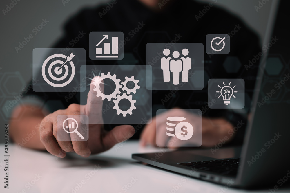 Aufkleber A businessman is working on a virtual innovation screen, which is used for operations management, business process and problem-solving, workflow, and high-quality control.