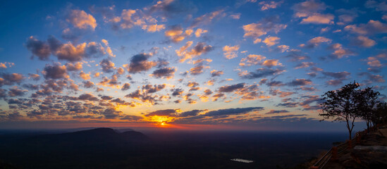 Morning atmosphere with the orange, yellow, red light of the sun at Pha Mor E Daeng, Sisaket Province, Thailand © Sun Image
