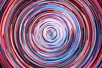 Neon circle lines with empty copy space inside isolated on black background. Colorful led lights...