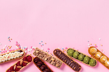 Eclairs with pistachio raspberries and chocolate cream topping