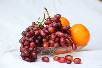 Grapes and Oranges in a glass bowl still #2