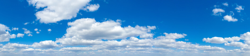 Blue Sky background with tiny Clouds. Panorama background