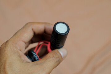 External microphone for camera or smartphone in male hands