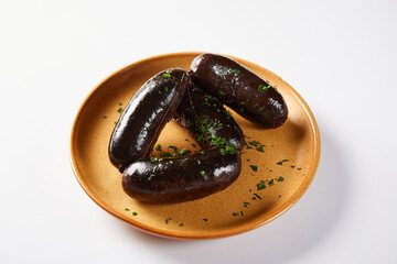 Morcilla, a traditional Ecuadorian sausage. On a white background