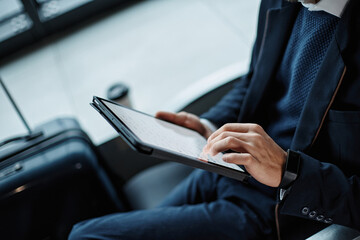 cropped image of a businessman with a digital tablet . - 489246200