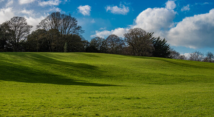 Green hills and blue sky Spring landscape wallpaper that is very similar to the famous Windows XP wallpaper