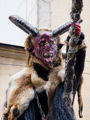 Devil with horns portrait outside. 