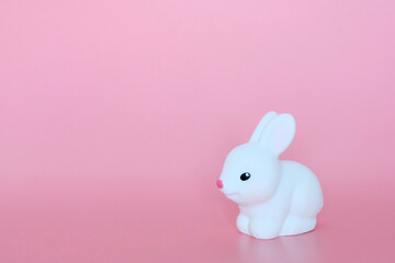 pink , rabbit on white