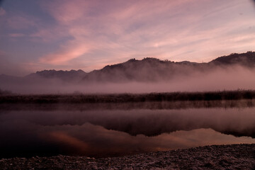 foggy winter morning on the Adda river in Brivio Lombardy - 489251646