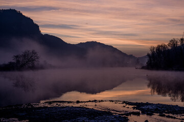 foggy winter morning on the Adda river in Brivio Lombardy - 489251663