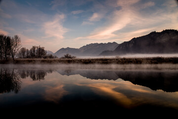 foggy winter morning on the Adda river in Brivio Lombardy - 489251683