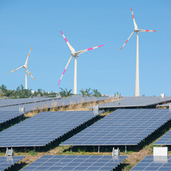 Big solar power plant and giant wind turbines as universal green ecofriendly energy solution in...