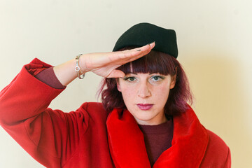 military caucasian woman soldier  greeting - soviet salutation concept