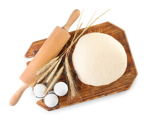 Raw dough with rolling pin and eggs on white background