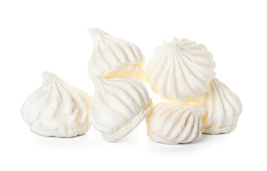 Many delicious meringue isolated on white background