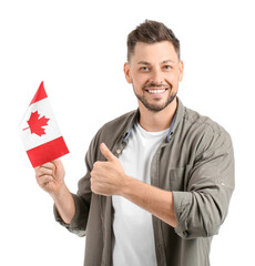 Happy young man with flag of Canada showing thumb-up on white background