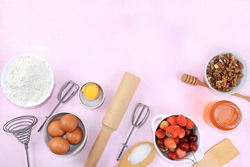 Kitchen background, cooking, Strawberry cherry pie recipe. Eggs, flour, sugar, strawberries and honey, top view, flat lay. Bakery background, modern bakery concept