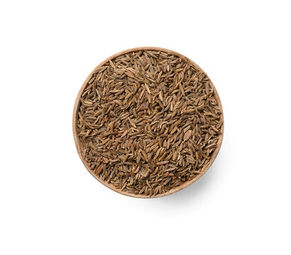Bowl of cumin seeds isolated on white background