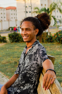 Portrait of a man with long curly hair