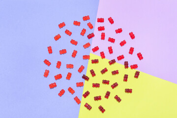 Yummy jelly bears on color background
