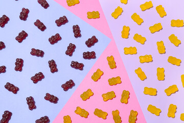Yummy jelly bears on color background