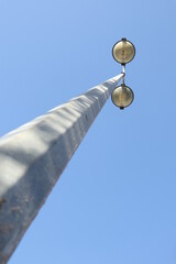 street lamp on blue sky
