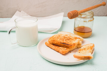 Toast with honey and milk.