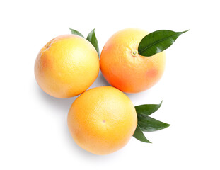 Fresh whole grapefruits on white background