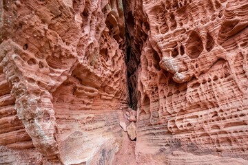 holes in stone - Tafoni weathering in red sandstone