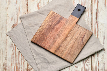 Cutting board on wooden  background