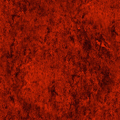 The red, dirty surface of the dry earth. Red seamless background with a mottled texture.
