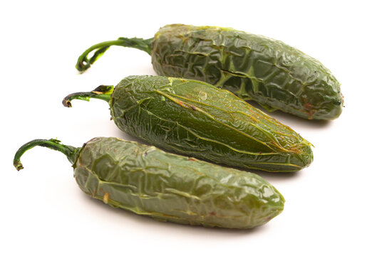 Grilled Jalapeno Peppers on a White Background