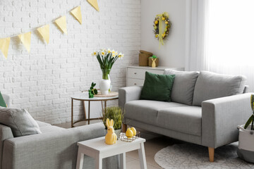 Modern living room with stylish Easter decor