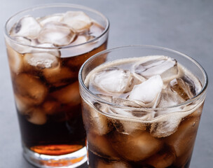 Cola soda, soft drink in cups with ice