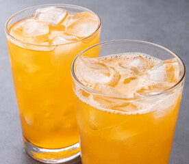 Orange soda, soft drink in cups with ice