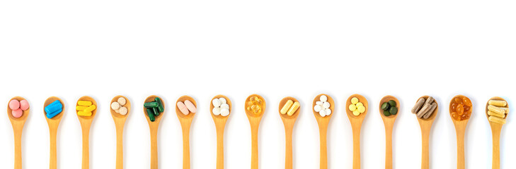 Supplements and vitamins on a white background. Selective focus.