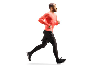Full length profile shot of a guy in sportswear running