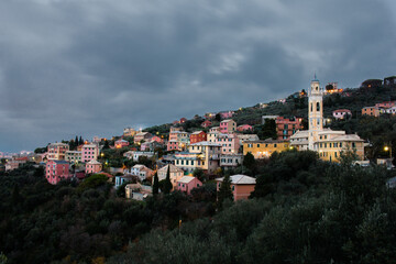 view of an italian town at the dusk with cloudy sky.