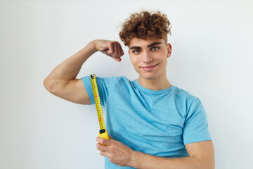 kinky guy blue t-shirt measuring tape posing Lifestyle unaltered