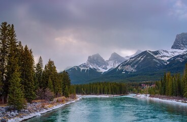 Clouds Over Canmore Mountains And River