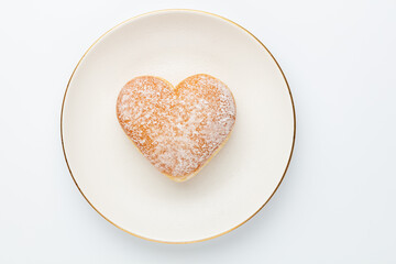 Doughnuts in the shape of a heart, heart-shaped cruller.