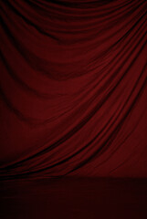 Dark red canvas or muslin fabric cloth studio backdrop or background.