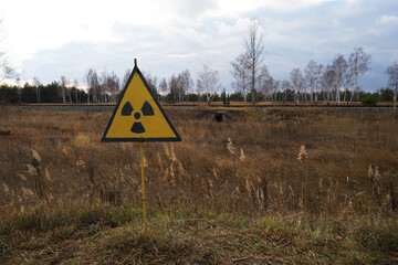 Nuclear radioactive danger sign in Chernobyl exclusion zone around Chornobyl Nuclear Power Station