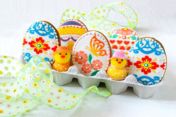 Fototapeta na wymiar Colorful painted Easter egg shaped gingerbreads