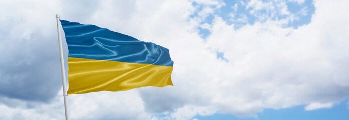ukrainian flag waving on a beautiful day