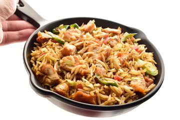 chicken fried rice in pan isolated on white background