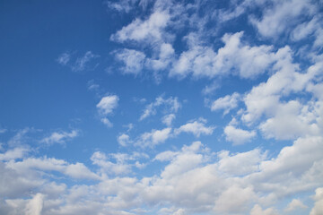 Naklejka na ściany i meble Beautiful background sky with clouds in and blue sky